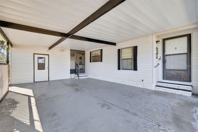 This 1652 SF 2-bedroom 2-bath home, located in the desirable Fox on Bay Tree Golf Course in Florida - for sale on GolfHomes.com, golf home, golf lot