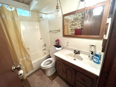 This home in the pines called 'Lil Oak Hill' is beautifully on Pine Mountain Lake Country Club in California - for sale on GolfHomes.com, golf home, golf lot