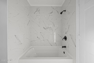 Welcome to this stately brick riverfront home nestled in the on River Bend Golf and Country Club in North Carolina - for sale on GolfHomes.com, golf home, golf lot