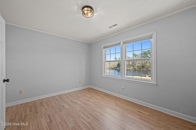 Welcome to this stately brick riverfront home nestled in the on River Bend Golf and Country Club in North Carolina - for sale on GolfHomes.com, golf home, golf lot