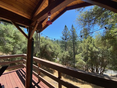 This home in the pines called 'Lil Oak Hill' is beautifully on Pine Mountain Lake Country Club in California - for sale on GolfHomes.com, golf home, golf lot