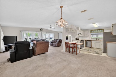 This 1652 SF 2-bedroom 2-bath home, located in the desirable Fox on Bay Tree Golf Course in Florida - for sale on GolfHomes.com, golf home, golf lot