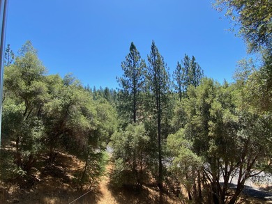 This home in the pines called 'Lil Oak Hill' is beautifully on Pine Mountain Lake Country Club in California - for sale on GolfHomes.com, golf home, golf lot