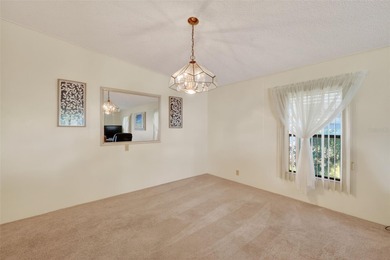 This 1652 SF 2-bedroom 2-bath home, located in the desirable Fox on Bay Tree Golf Course in Florida - for sale on GolfHomes.com, golf home, golf lot