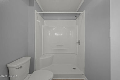 Welcome to this stately brick riverfront home nestled in the on River Bend Golf and Country Club in North Carolina - for sale on GolfHomes.com, golf home, golf lot