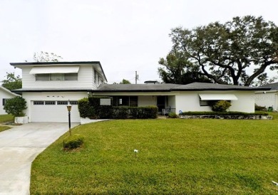 Under contract-accepting backup offers. Fantastic potential for on The Dunedin Country Club in Florida - for sale on GolfHomes.com, golf home, golf lot