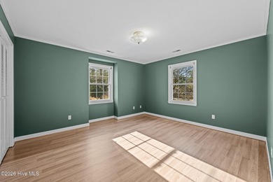 Welcome to this stately brick riverfront home nestled in the on River Bend Golf and Country Club in North Carolina - for sale on GolfHomes.com, golf home, golf lot