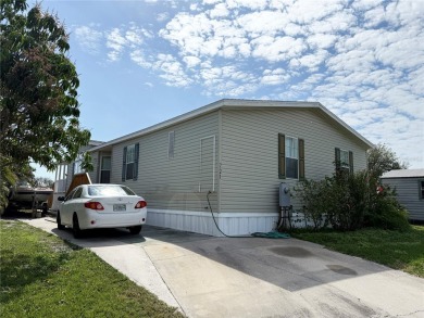 Spacious WATERFRONT Gulf access 2005 manufactured home located on Saint Andrews South Golf Club in Florida - for sale on GolfHomes.com, golf home, golf lot