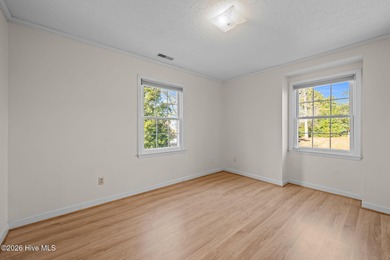 Welcome to this stately brick riverfront home nestled in the on River Bend Golf and Country Club in North Carolina - for sale on GolfHomes.com, golf home, golf lot