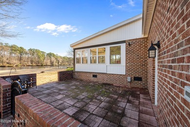 Welcome to this stately brick riverfront home nestled in the on River Bend Golf and Country Club in North Carolina - for sale on GolfHomes.com, golf home, golf lot