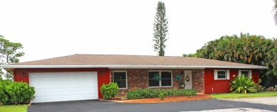 Your own private paradise in this 3/2/2 CBS home in desirable on Martin County Golf Course in Florida - for sale on GolfHomes.com, golf home, golf lot
