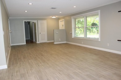 Your own private paradise in this 3/2/2 CBS home in desirable on Martin County Golf Course in Florida - for sale on GolfHomes.com, golf home, golf lot