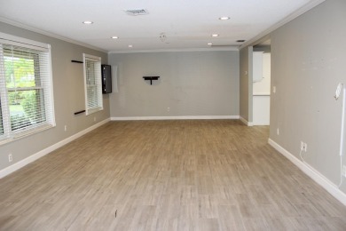 Your own private paradise in this 3/2/2 CBS home in desirable on Martin County Golf Course in Florida - for sale on GolfHomes.com, golf home, golf lot