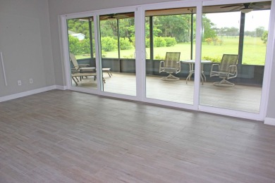 Your own private paradise in this 3/2/2 CBS home in desirable on Martin County Golf Course in Florida - for sale on GolfHomes.com, golf home, golf lot