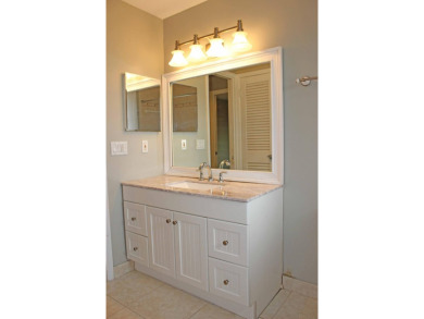 Your own private paradise in this 3/2/2 CBS home in desirable on Martin County Golf Course in Florida - for sale on GolfHomes.com, golf home, golf lot