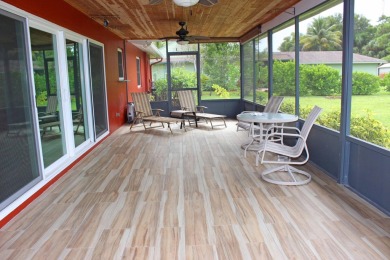 Your own private paradise in this 3/2/2 CBS home in desirable on Martin County Golf Course in Florida - for sale on GolfHomes.com, golf home, golf lot