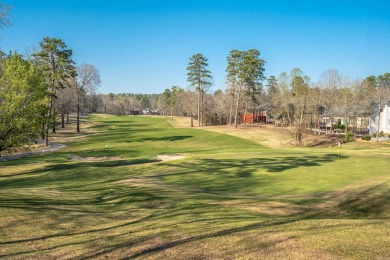 This home offers a prime location, overlooking the 15 Green on on Ponce De Leon Golf Course in Arkansas - for sale on GolfHomes.com, golf home, golf lot