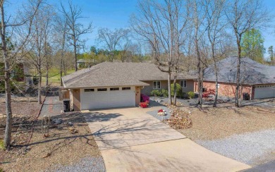 SPACIOUS AND COZY, this home is perfect for your personal oasis on Coronado Golf Course in Arkansas - for sale on GolfHomes.com, golf home, golf lot