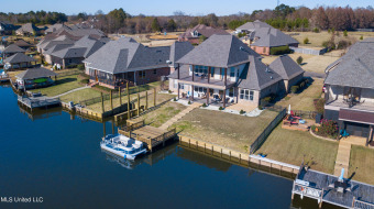 Stunning Waterfront Home at THE SHORES OF LAKE CAROLINE! With on Lake Caroline Golf Club in Mississippi - for sale on GolfHomes.com, golf home, golf lot