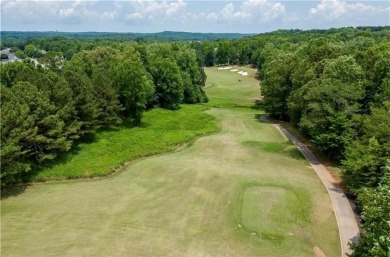 Welcome to this exquisite John Weiland-designed estate, where on Reunion Golf Club in Georgia - for sale on GolfHomes.com, golf home, golf lot