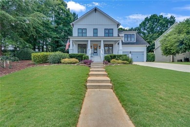 Welcome to this exquisite John Weiland-designed estate, where on Reunion Golf Club in Georgia - for sale on GolfHomes.com, golf home, golf lot