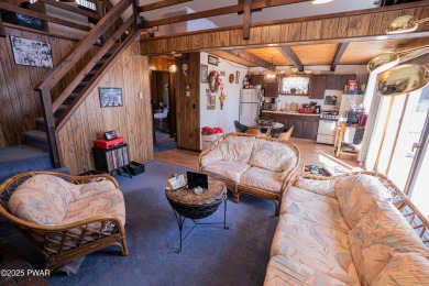Escape to Your Perfect Poconos Chalet in The Hideout!Tucked away on The Hideout Golf in Pennsylvania - for sale on GolfHomes.com, golf home, golf lot