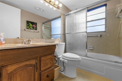 LOCATION LOCATION!!! HIGHLY DESIRABLE CORNER UNIT ON THE TOP on Hillsboro Pines Golf in Florida - for sale on GolfHomes.com, golf home, golf lot