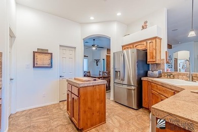 Wake up to big desert skies and mountain views in this warm on Foothills Executive Golf Course in Arizona - for sale on GolfHomes.com, golf home, golf lot