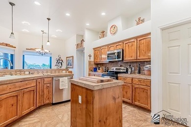 Wake up to big desert skies and mountain views in this warm on Foothills Executive Golf Course in Arizona - for sale on GolfHomes.com, golf home, golf lot