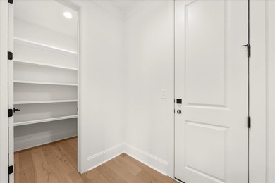 Discover this stunning new construction perched directly on on Harbor Club Golf and Country Club in Georgia - for sale on GolfHomes.com, golf home, golf lot