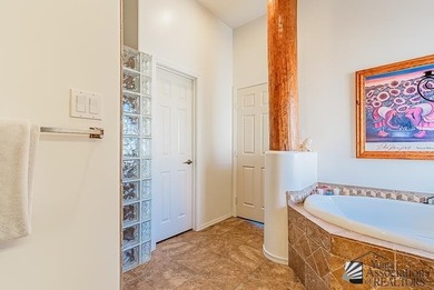 Wake up to big desert skies and mountain views in this warm on Foothills Executive Golf Course in Arizona - for sale on GolfHomes.com, golf home, golf lot