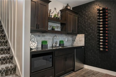 Step Into Designer Living - Move-In Ready Luxury Backing to on Heritage Park Golf Course in Kansas - for sale on GolfHomes.com, golf home, golf lot