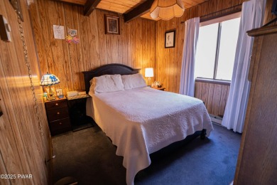 Escape to Your Perfect Poconos Chalet in The Hideout!Tucked away on The Hideout Golf in Pennsylvania - for sale on GolfHomes.com, golf home, golf lot