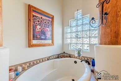 Wake up to big desert skies and mountain views in this warm on Foothills Executive Golf Course in Arizona - for sale on GolfHomes.com, golf home, golf lot