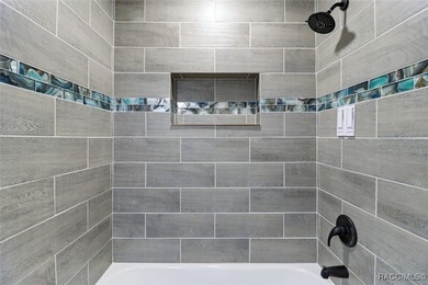 Welcome to this beautifully renovated 3-bedroom, 2-bath home on Brentwood Farms Golf Club in Florida - for sale on GolfHomes.com, golf home, golf lot