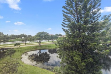LOCATION LOCATION!!! HIGHLY DESIRABLE CORNER UNIT ON THE TOP on Hillsboro Pines Golf in Florida - for sale on GolfHomes.com, golf home, golf lot