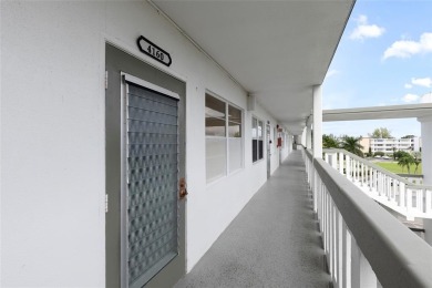LOCATION LOCATION!!! HIGHLY DESIRABLE CORNER UNIT ON THE TOP on Hillsboro Pines Golf in Florida - for sale on GolfHomes.com, golf home, golf lot