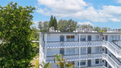 LOCATION LOCATION!!! HIGHLY DESIRABLE CORNER UNIT ON THE TOP on Hillsboro Pines Golf in Florida - for sale on GolfHomes.com, golf home, golf lot