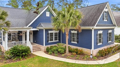 Welcome to 196 Low Country Loop, a refined coastal retreat on TPC Myrtle Beach Golf Club in South Carolina - for sale on GolfHomes.com, golf home, golf lot
