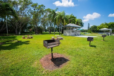 LOCATION LOCATION!!! HIGHLY DESIRABLE CORNER UNIT ON THE TOP on Hillsboro Pines Golf in Florida - for sale on GolfHomes.com, golf home, golf lot