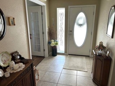 Step into this immaculately maintained 2-bedroom, 2-bathroom on Sun n Lake Golf and Country Club in Florida - for sale on GolfHomes.com, golf home, golf lot