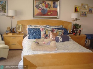 This 1st floor inside corner condo has an assigned parking spot on Sunrise Lakes Phase IV Golf Course in Florida - for sale on GolfHomes.com, golf home, golf lot
