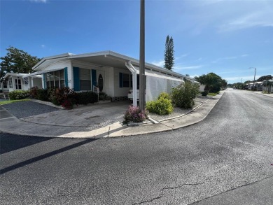 Positioned within the vibrant Palm Hill Country Club, a on Palm Hill Golf Club in Florida - for sale on GolfHomes.com, golf home, golf lot