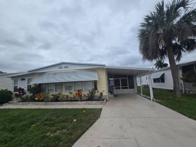Charming & Renovated 2-Bedroom, 2-Bath Double-Wide in Vibrant on Vista Plantation Golf Club in Florida - for sale on GolfHomes.com, golf home, golf lot