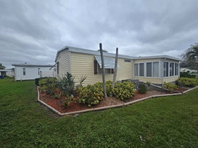 Charming & Renovated 2-Bedroom, 2-Bath Double-Wide in Vibrant on Vista Plantation Golf Club in Florida - for sale on GolfHomes.com, golf home, golf lot
