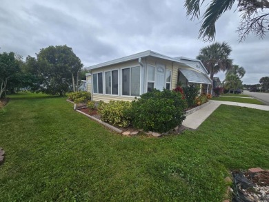 Charming & Renovated 2-Bedroom, 2-Bath Double-Wide in Vibrant on Vista Plantation Golf Club in Florida - for sale on GolfHomes.com, golf home, golf lot