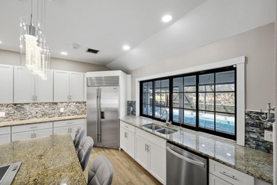 Come experience this impressive 6-bedroom, 5-bath residence with on St. Lucie Trail Golf Club in Florida - for sale on GolfHomes.com, golf home, golf lot