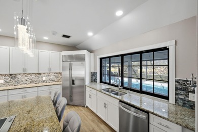 Come experience this impressive 6-bedroom, 5-bath residence with on St. Lucie Trail Golf Club in Florida - for sale on GolfHomes.com, golf home, golf lot