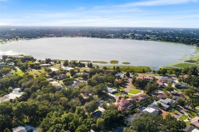 Just Steps from Lake Hollingsworth! Discover this exceptional 3 on Cleveland Heights Golf Course in Florida - for sale on GolfHomes.com, golf home, golf lot