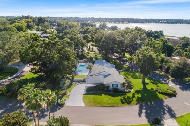 Just Steps from Lake Hollingsworth! Discover this exceptional 3 on Cleveland Heights Golf Course in Florida - for sale on GolfHomes.com, golf home, golf lot